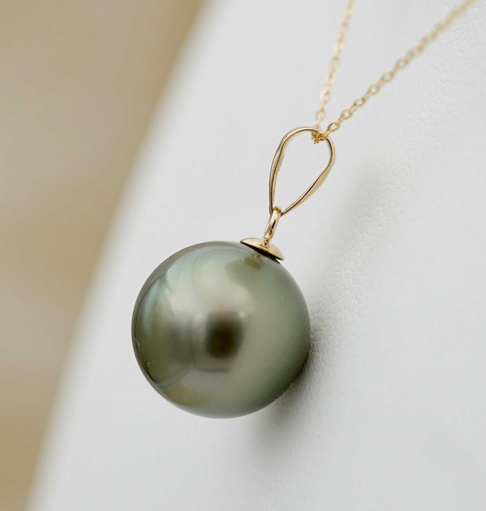 Collection Rima perle ronde de 11mm sur Or