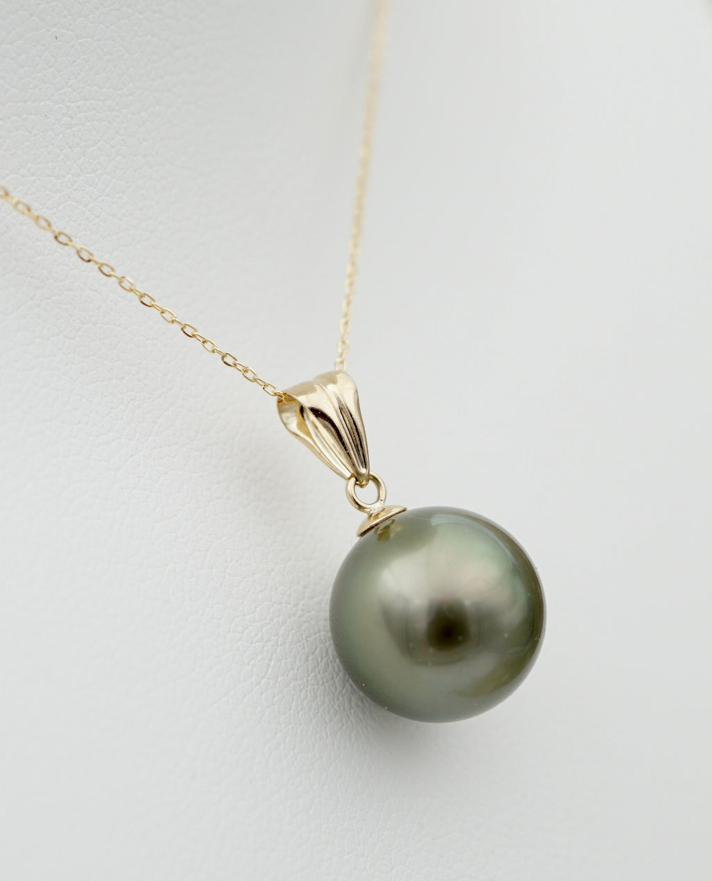 Collection Rima perle ronde de 11mm sur Or