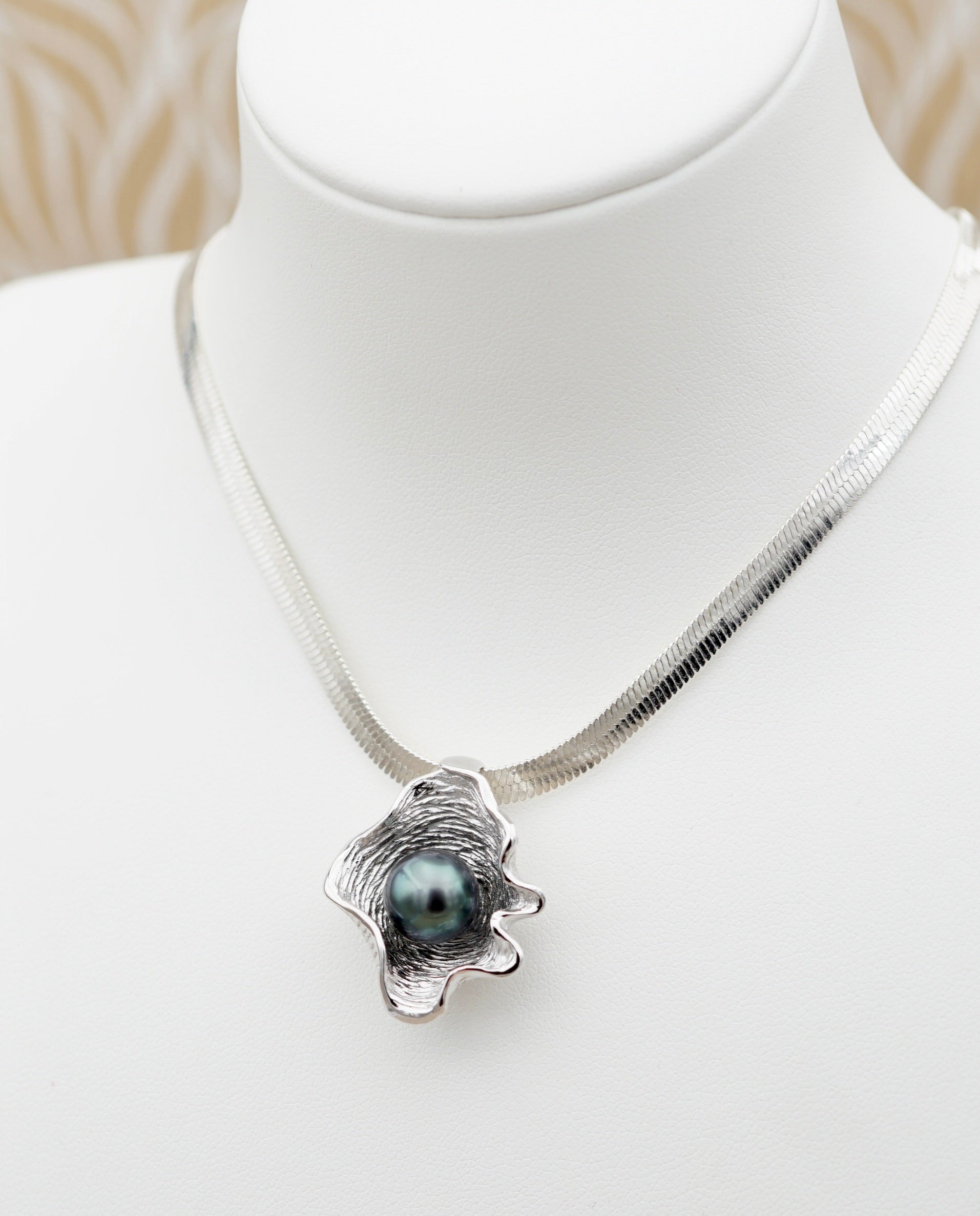 Pahua perle de Tahiti dans un bénitier en argent 925